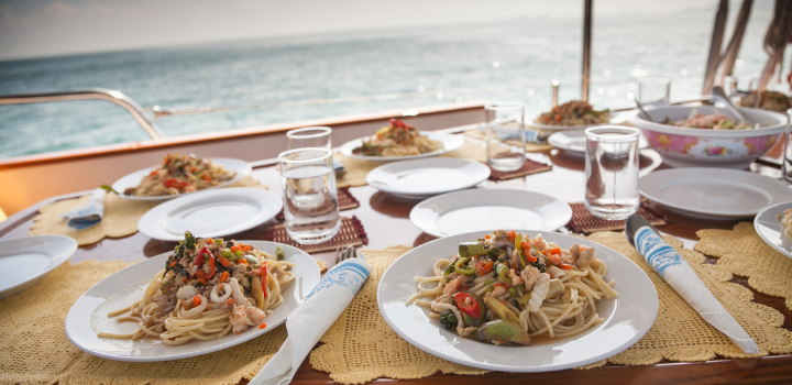 yachts-dining-2 Family Sailing Holidays in France with a Catamaran